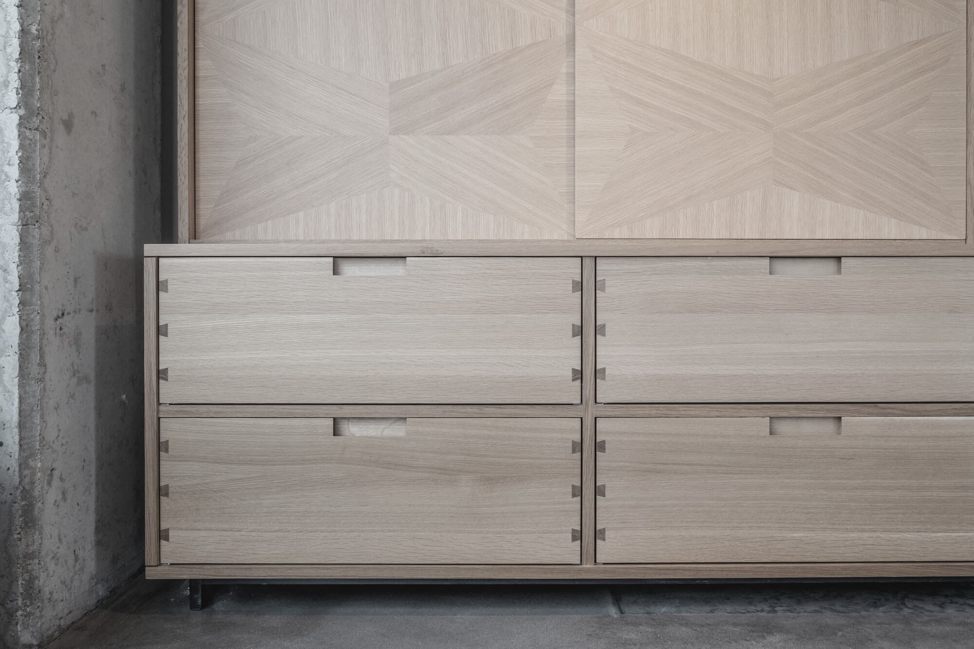 Bespoke custom cabinetry in Modern Tale: Through Dovetail Drawer