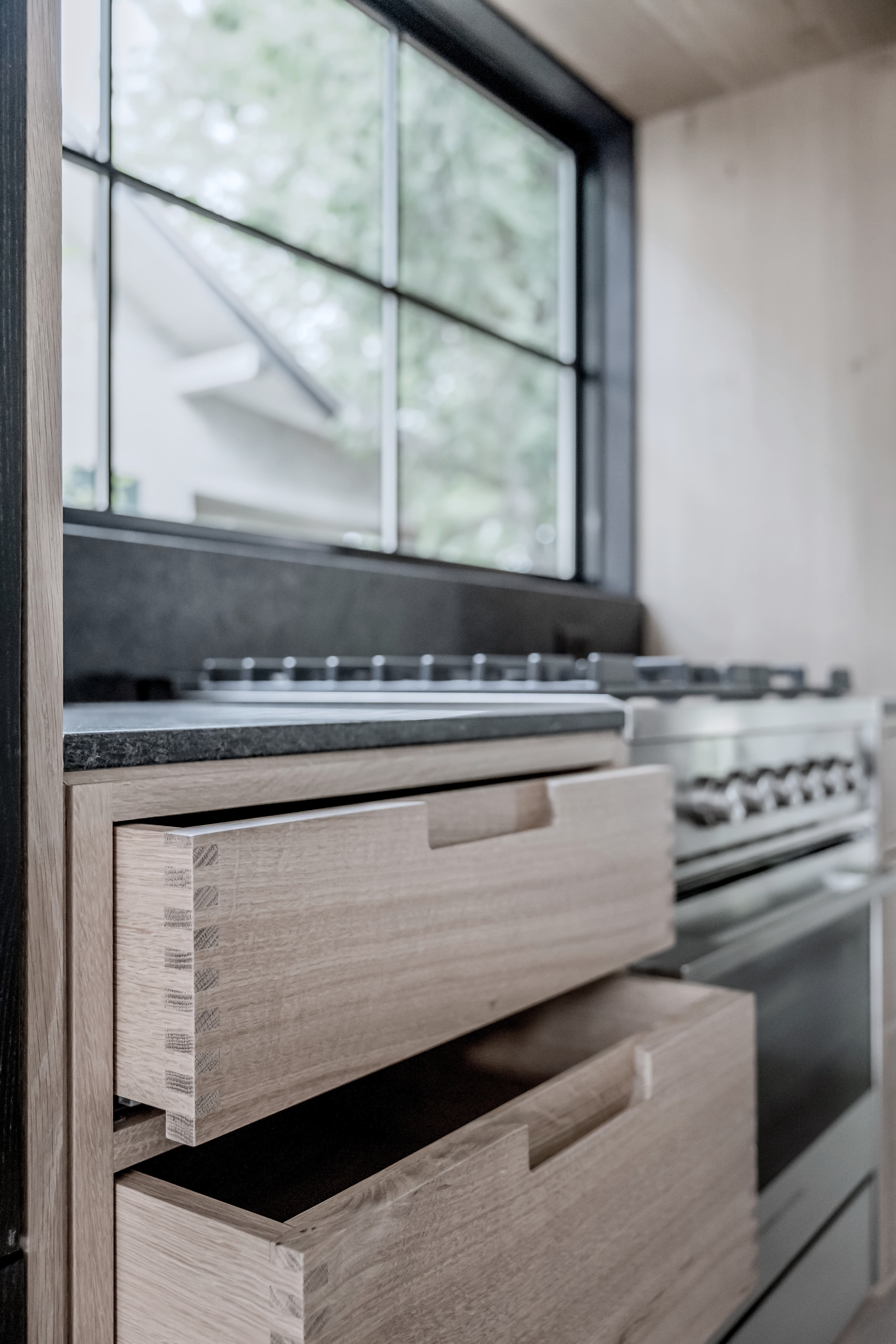 Bespoke custom cabinetry in Urban Oasis: Integrated Cabinet Handles
