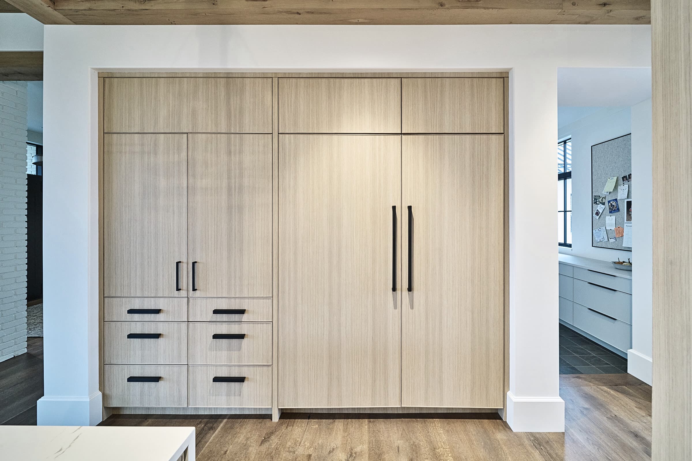 Bespoke custom cabinetry in Full Stretch: Integrated Appliance Panels
