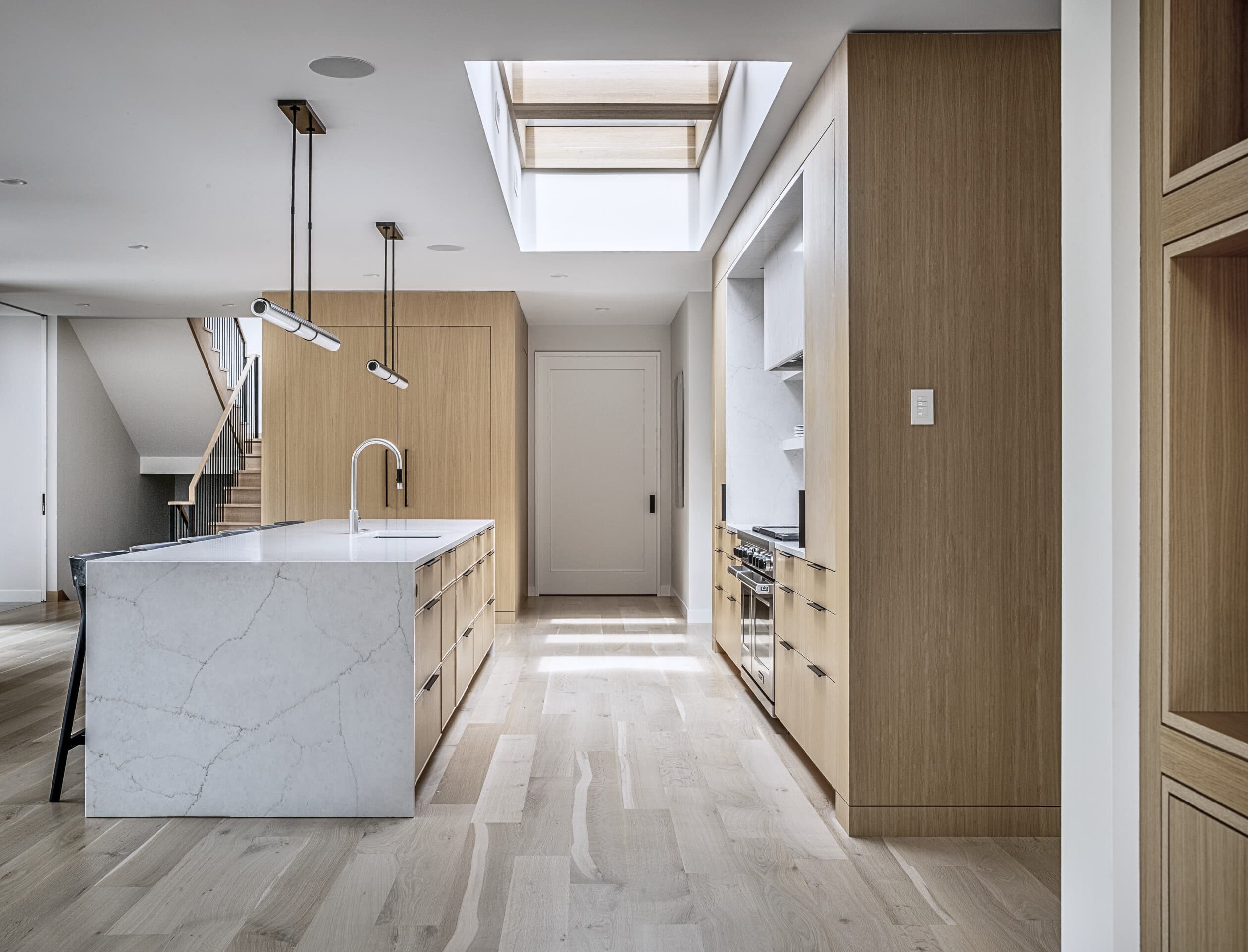 Bespoke custom cabinetry in Pool Vault: Waterfall Counter Top