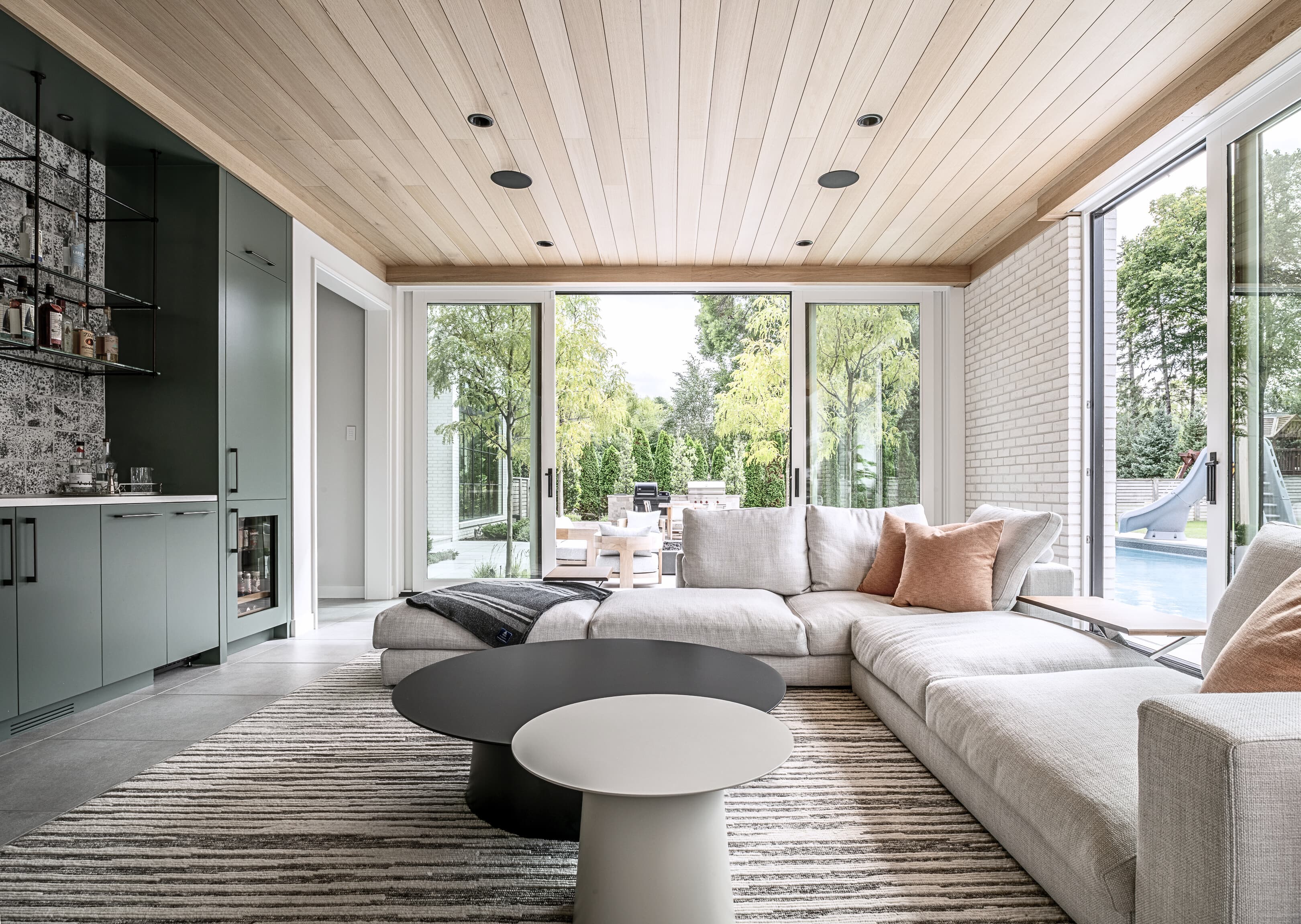Bespoke custom cabinetry in Pool Vault: Modern Pool Cabana