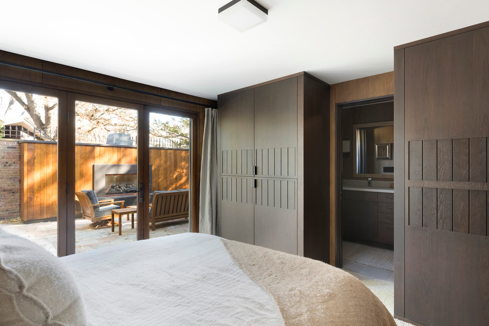 Bespoke custom cabinetry in Timber Tribute: Walnut Bedroom Wardrobe Patio 023